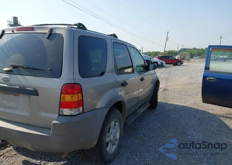 2001 Ford Escape Xlt z USA, uszkodzony, nr VIN 1FMCU04101KB58456